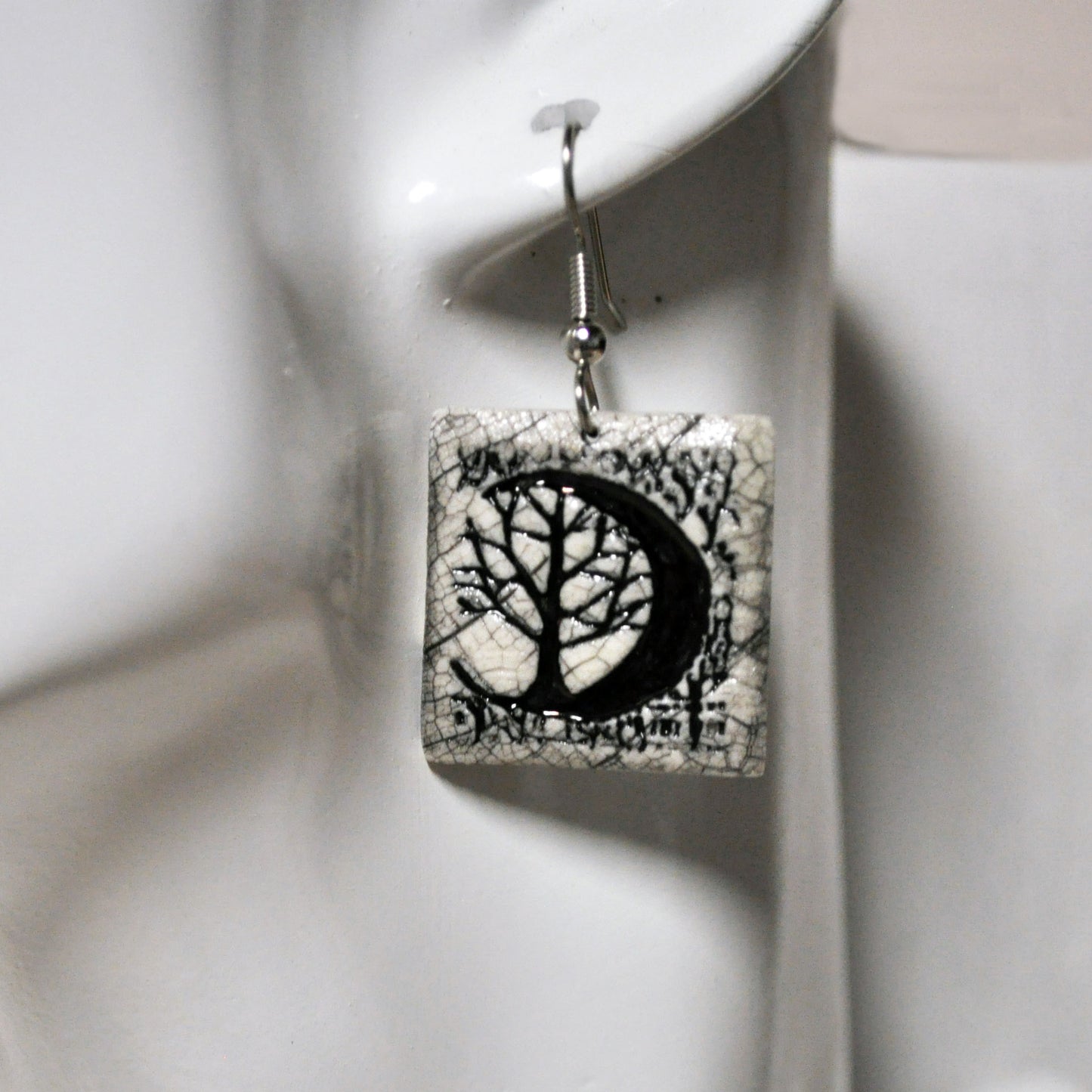 ems 725 crescent moon tree sq earrings on manne.jpg